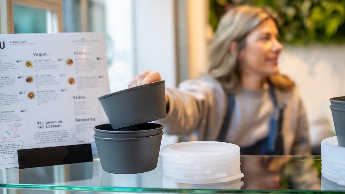 Woman shows reusable pots