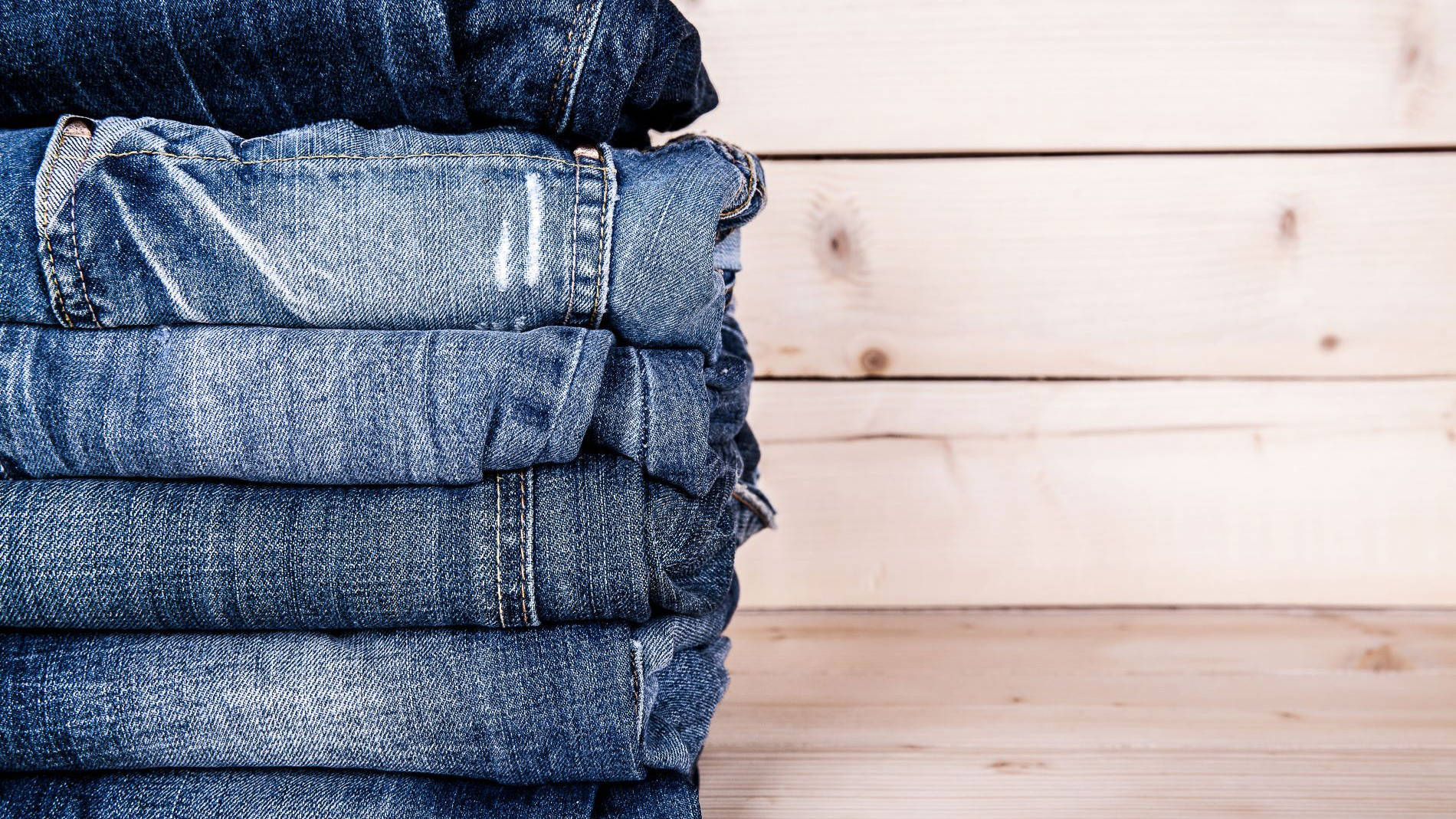 Folded jeans in a stack