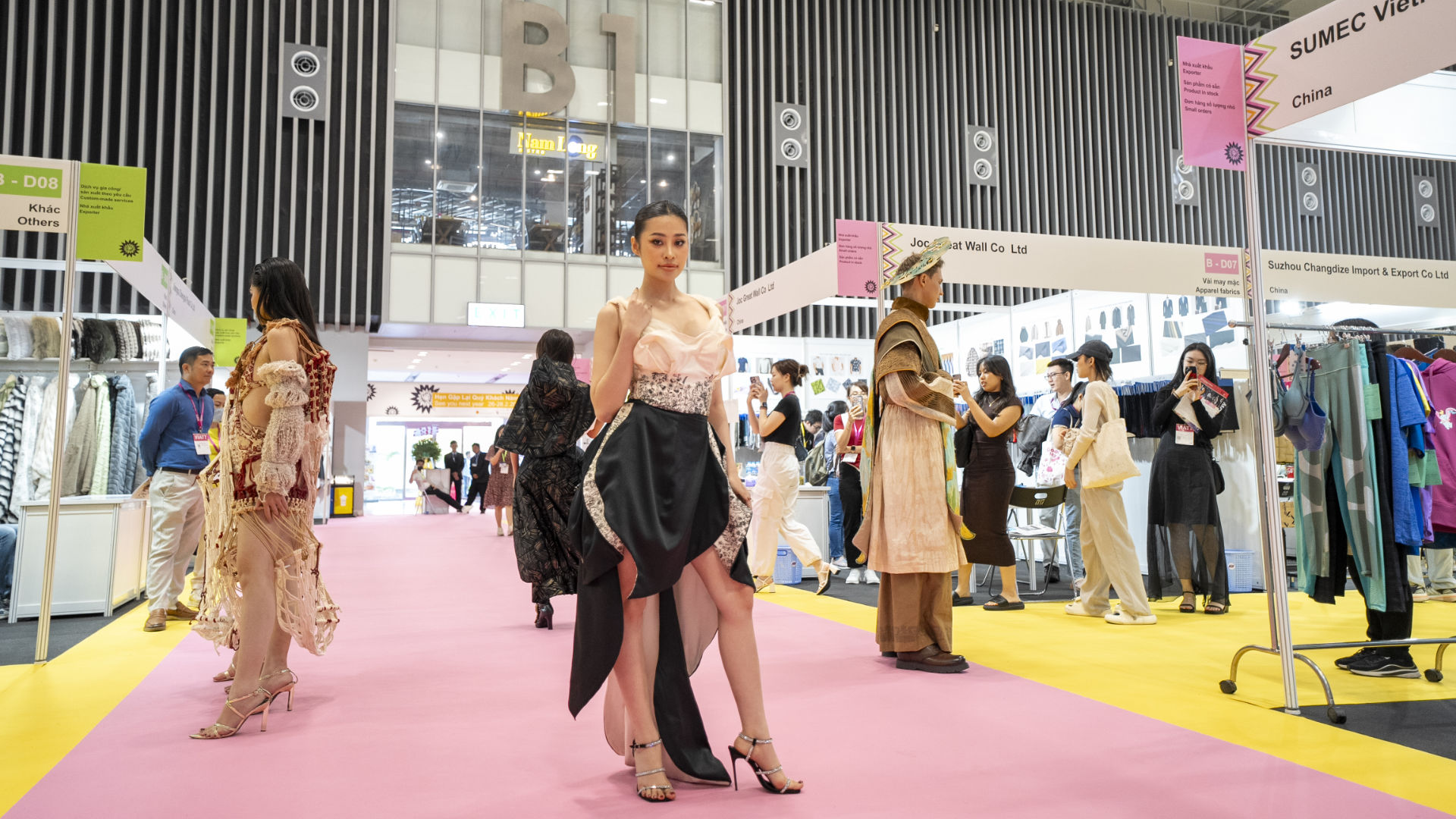 Models on the VIATT between exhibition stands