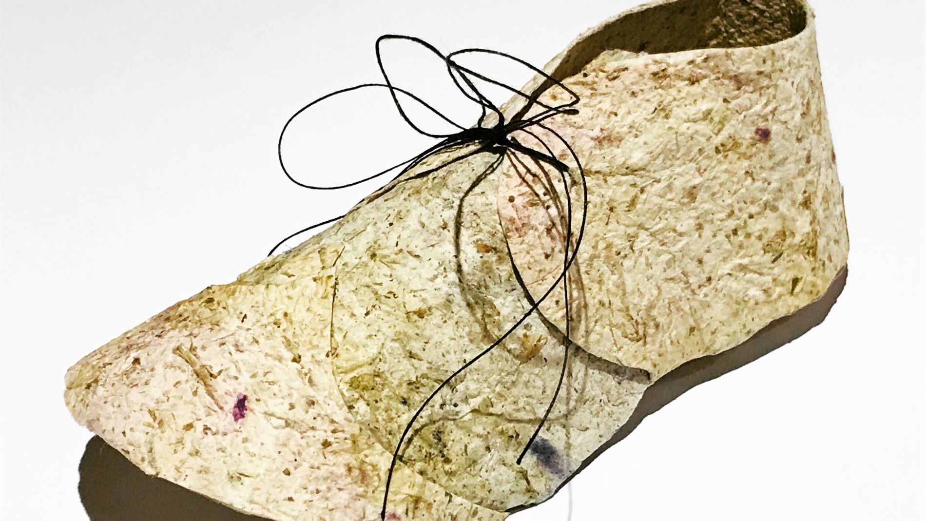 Handmade shoe made from grass and pea waste