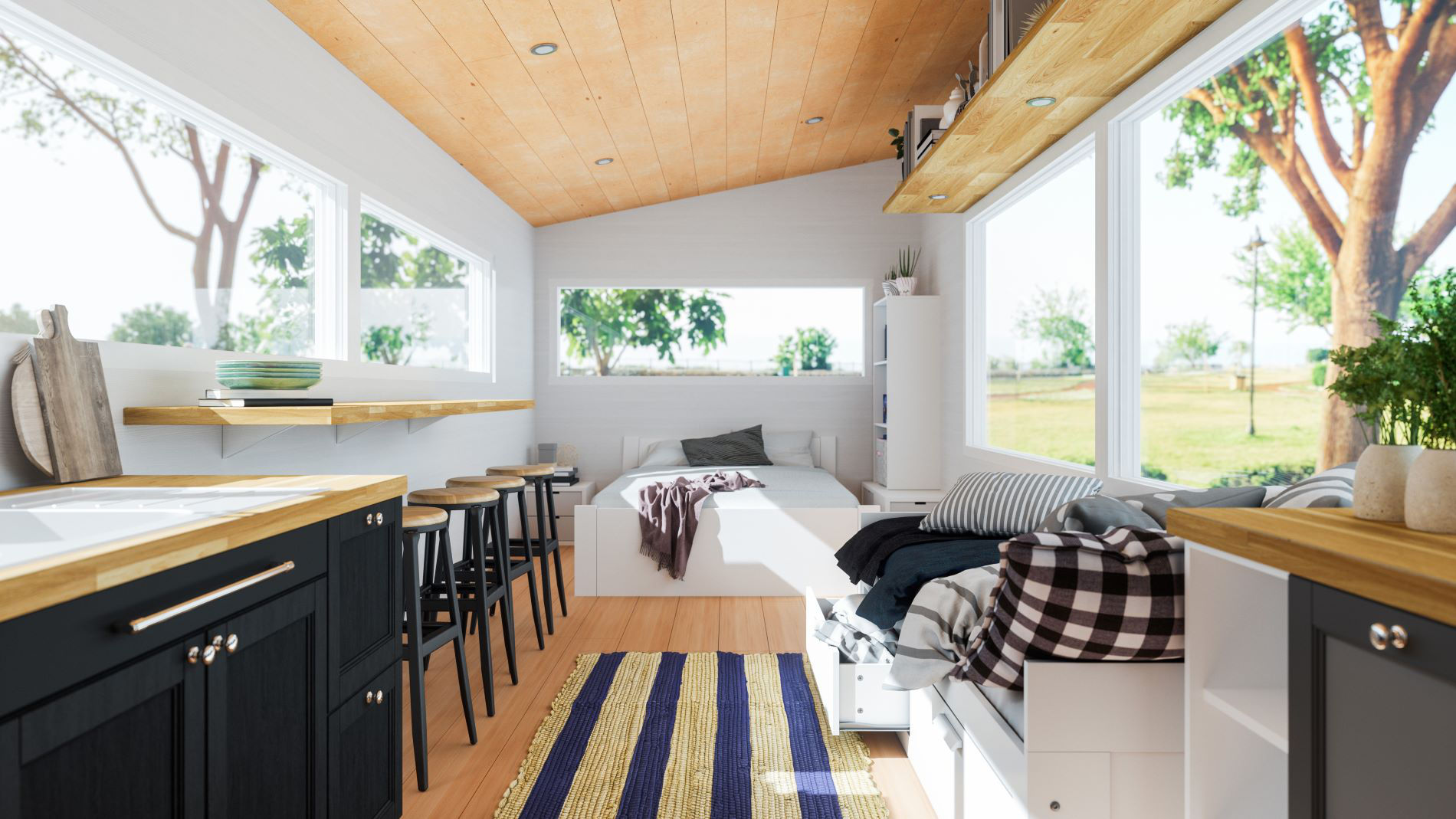 Bright tiny house with large windows, wooden ceiling, and modern interior