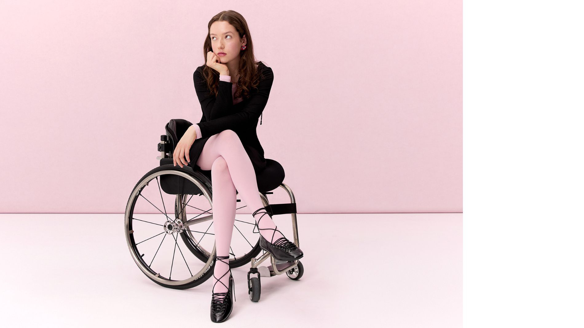 Fashion campaign featuring a wheelchair user in the studio