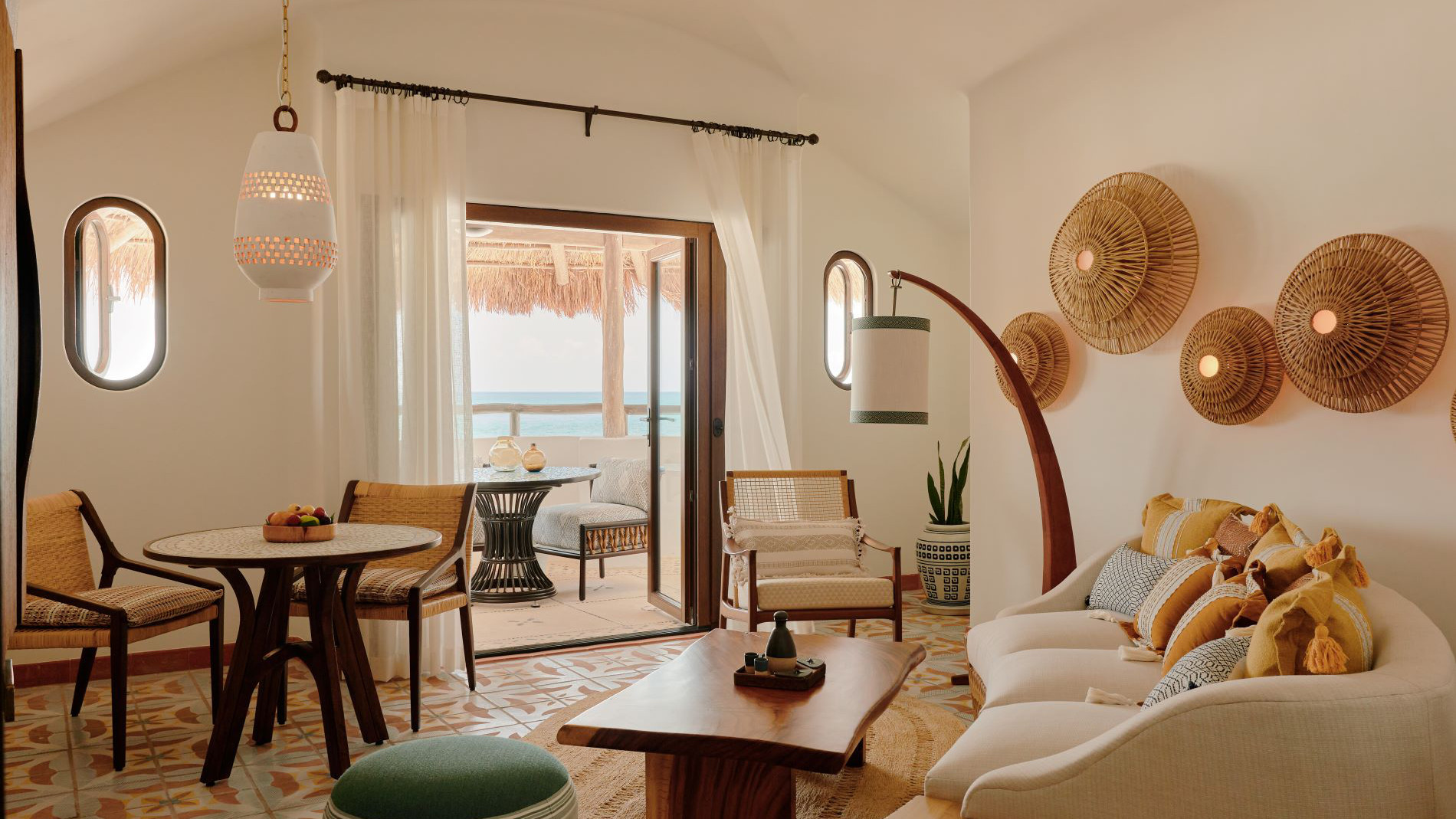 Mediterranean living space with terrace and warm accents.