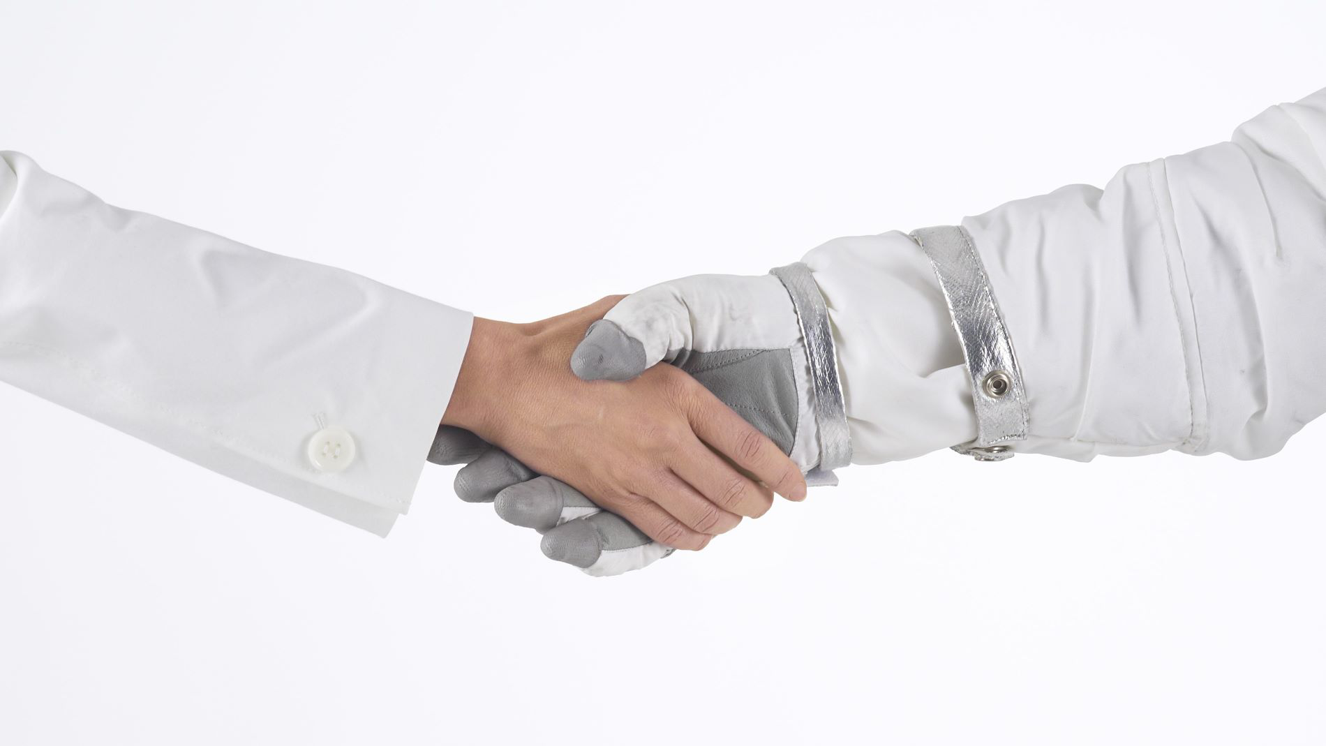 Handshake between human and astronaut