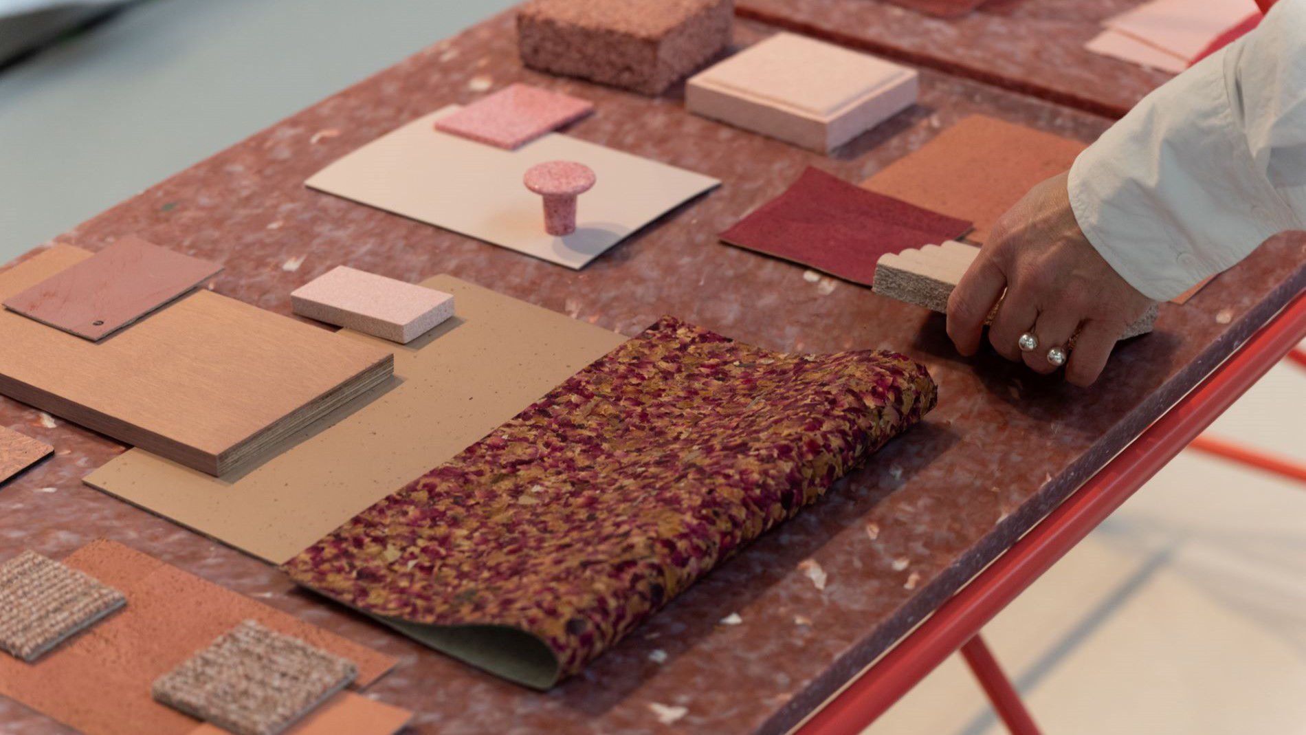 Designer reviewing innovative material samples for interior design