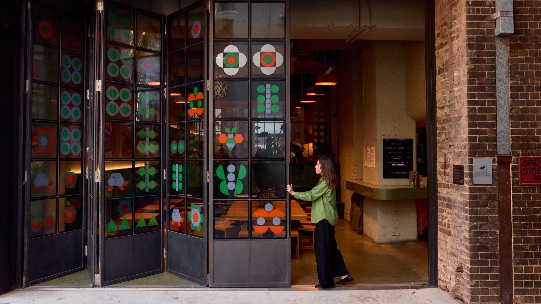 Hotel façade with artistic geometric window graphics